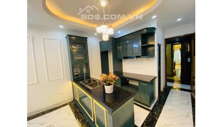 7 tầng thang máy , ô tô tránh lô góc dt 52m2 giá  ty phố MInh Khai